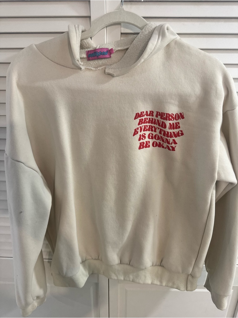 Edikted Cream Hoodie with Pink Brand Tag and Blue Embroidery